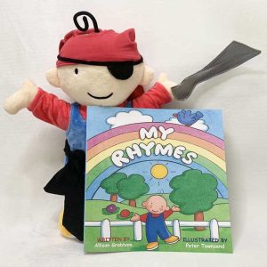 Danny dressed as a pirate with the My Rhymes book