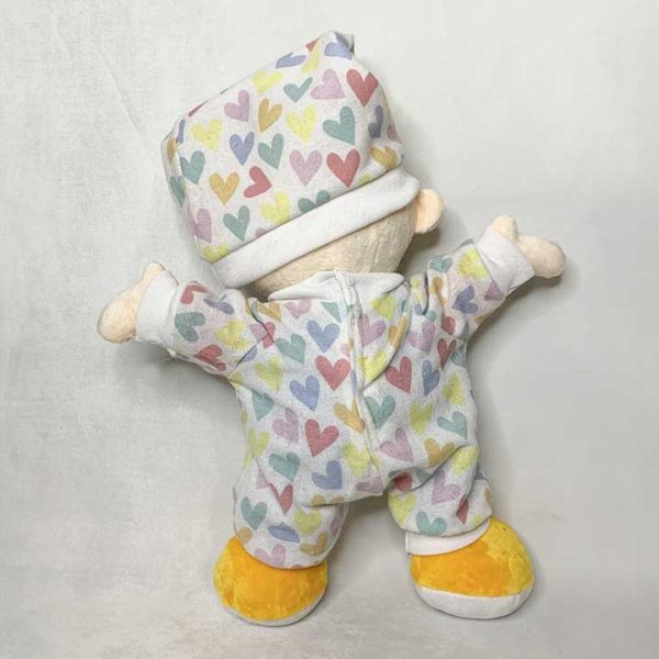 Danny doll dressed in pyjamas for goodnight - from the back